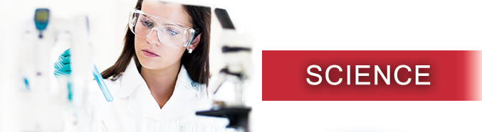 Picture of  a female student looking at a specimen in a lab setting